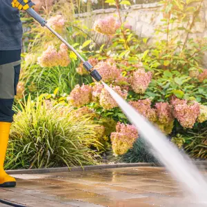 High-pressure cleaning of paving